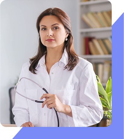 A female doctor is holding a stethoscope in her hand.