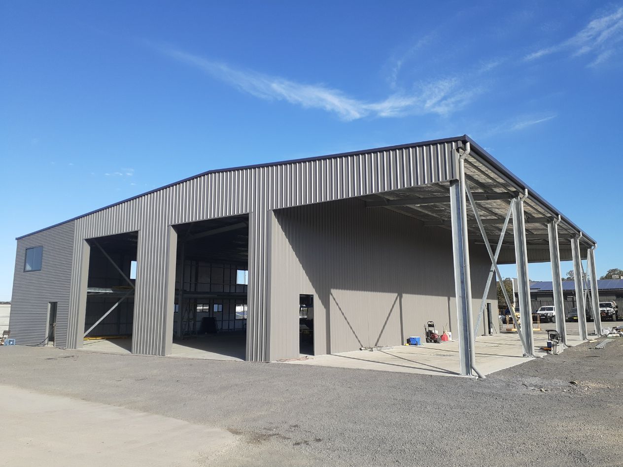 Under Construction Steel Gray Industrial Sheds - Handrails in Shoalhaven, NSW