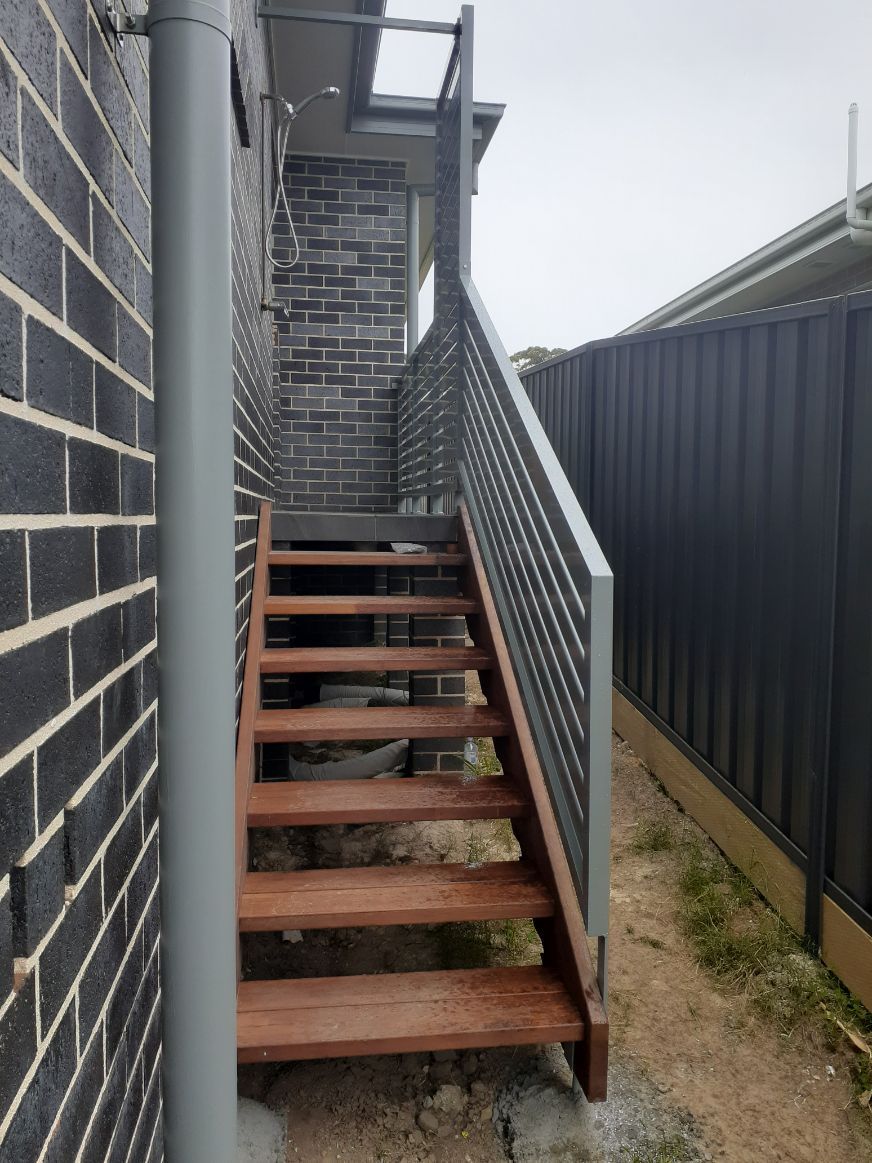 Side View Wood Stairs with Handrails For Enhanced Safety - Handrails in Shoalhaven, NSW