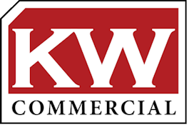 The KW Commercial logo with bold white text on a red background featuring a stylized cutout corner.