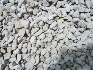 A pile of white gravel is sitting on the ground