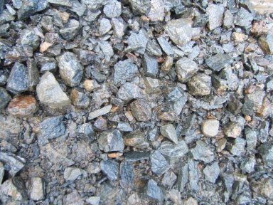 A pile of rocks is sitting on the ground