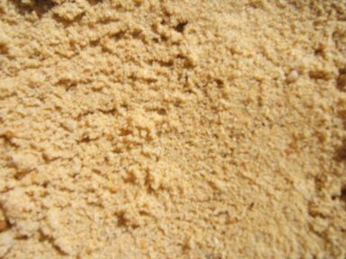 A close up of a pile of sand.
