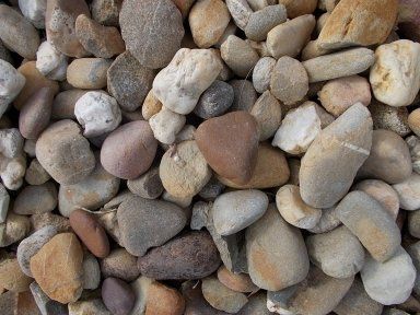 A pile of rocks of different sizes and colors