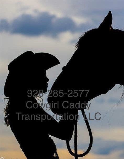 A woman in a cowboy hat is petting a horse
