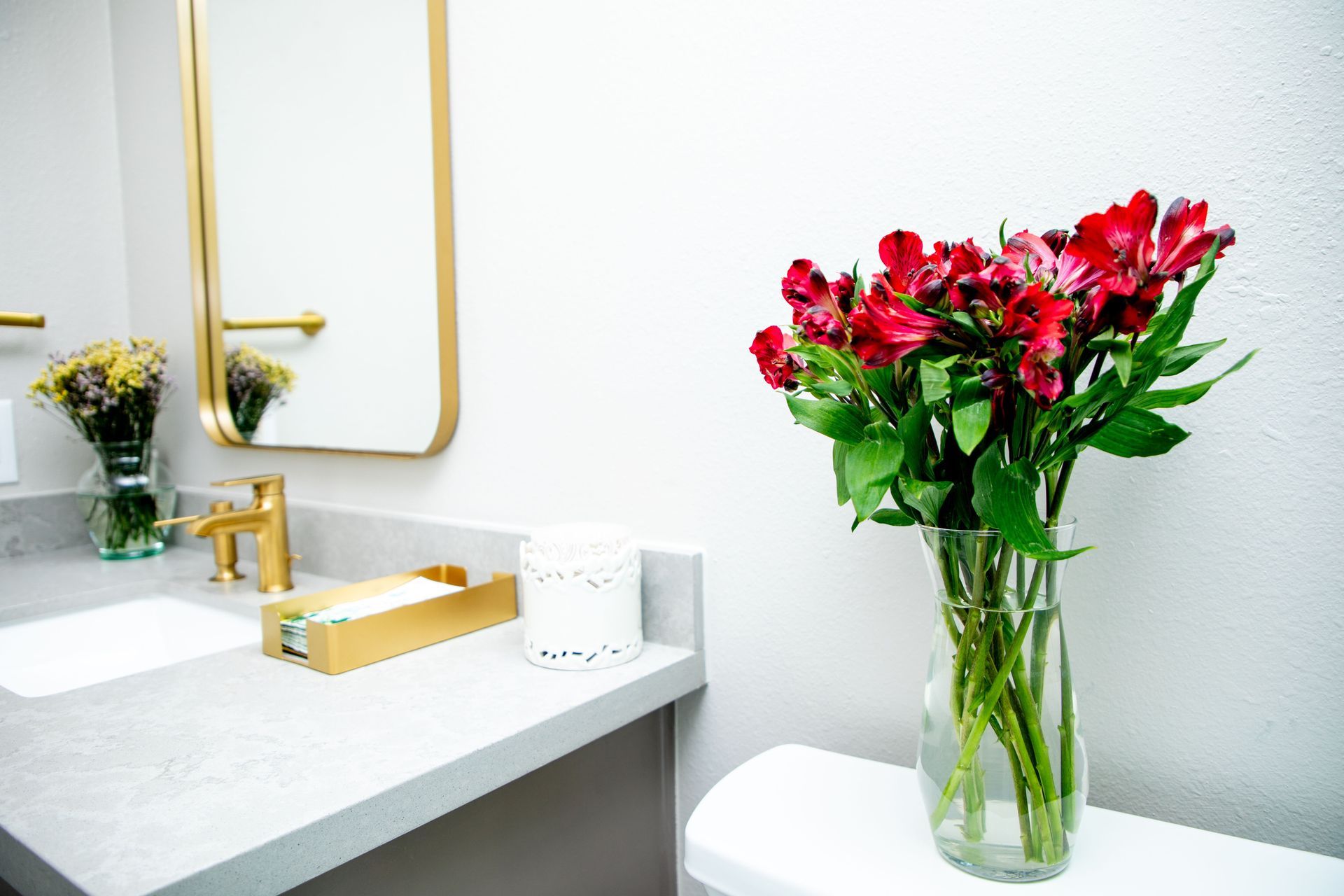 Living room with a white sofa, marble wall, black accent wall, and modern furniture.