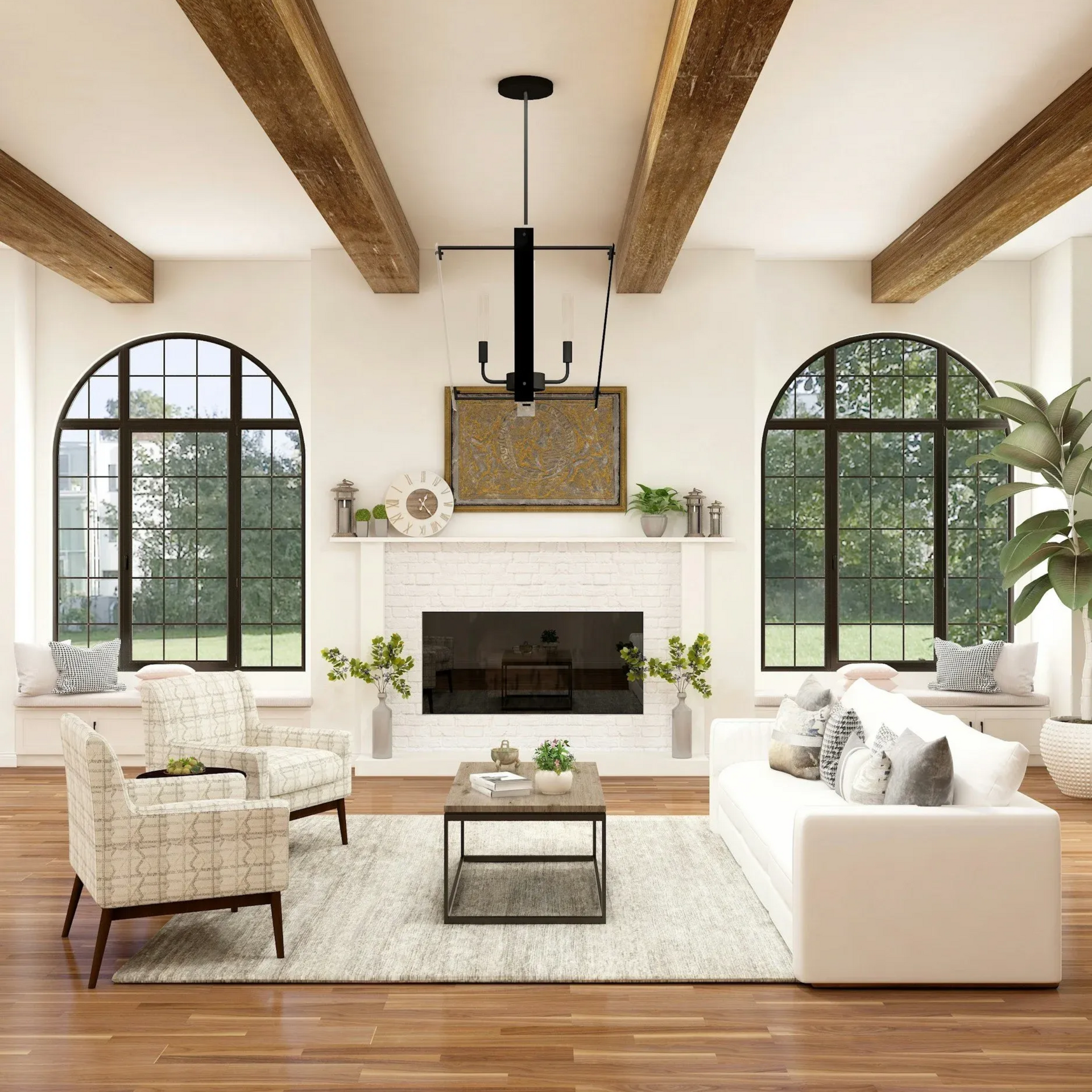 Living room with fireplace, arched windows, white sofa, two chairs, and wooden beams.
