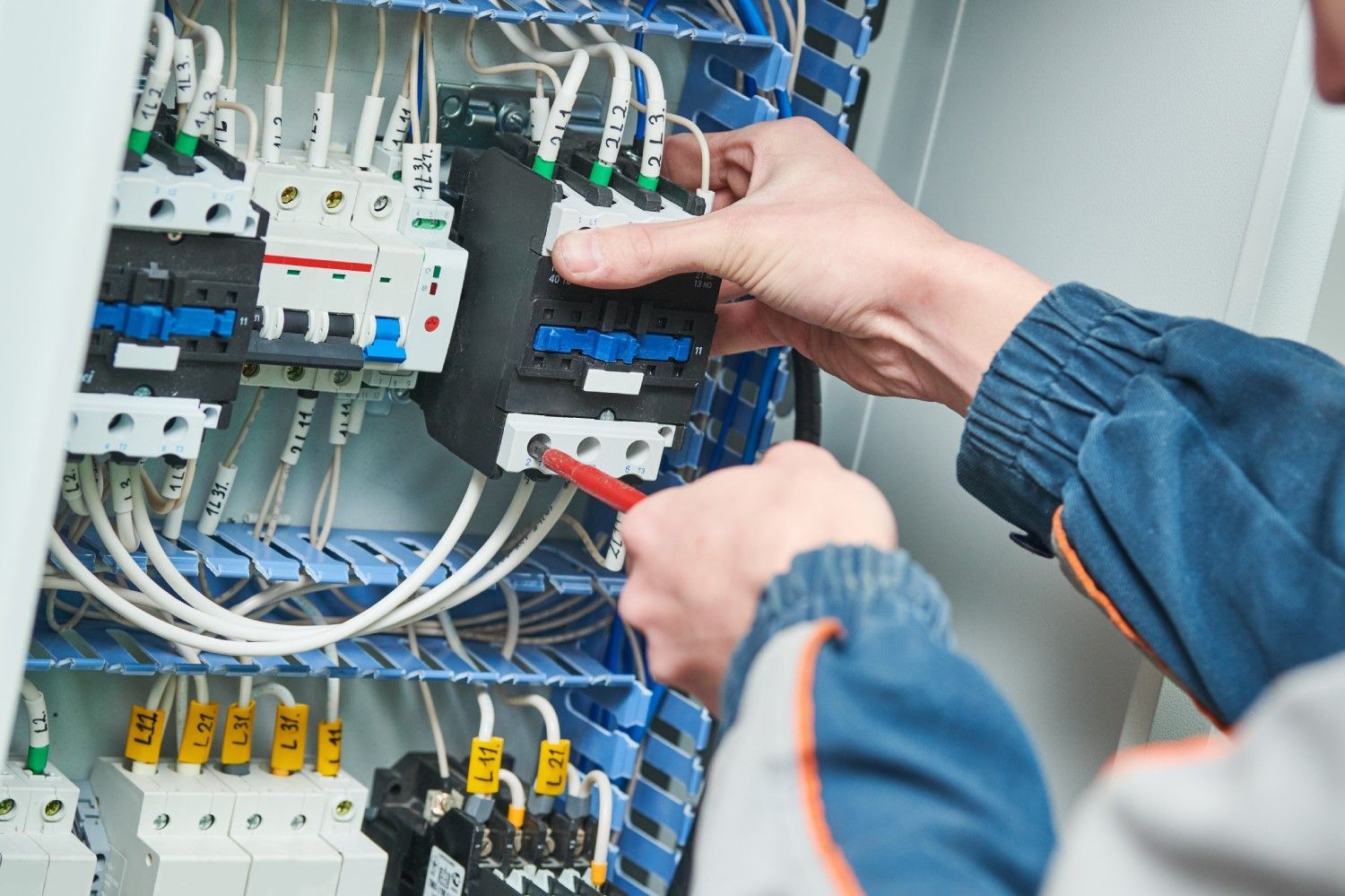 Electrician wiring commercial panel