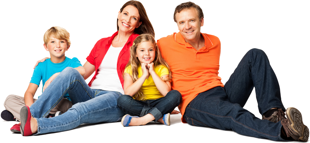 A family is sitting on the floor together on a white background.