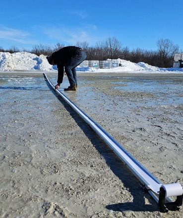 Operator setting up a swath test