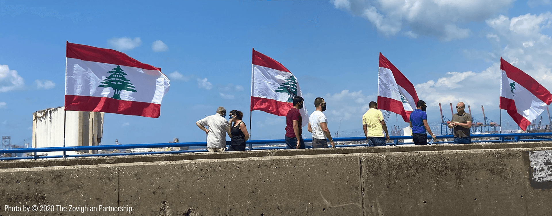 Following the Beirut blast, protestors rallying on the bridge deployed with Lebanese flags