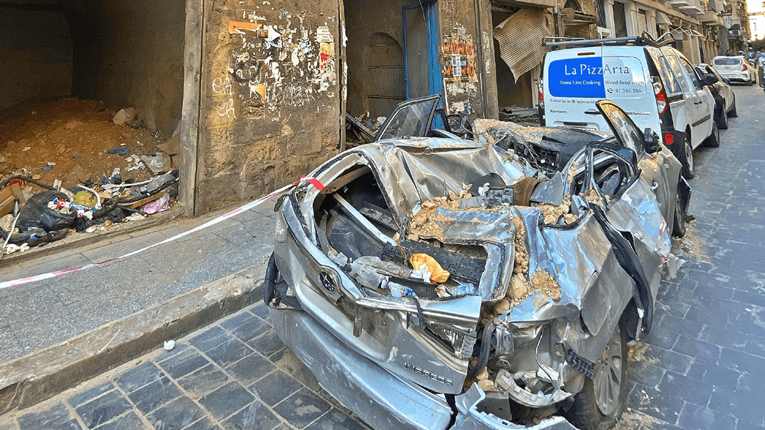 Photo of a crushed cars under the rubbles in the street after the Beirut Explosion