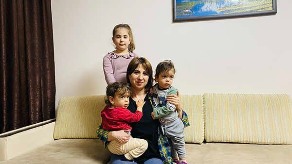 A woman with her 3 children in Artsakh