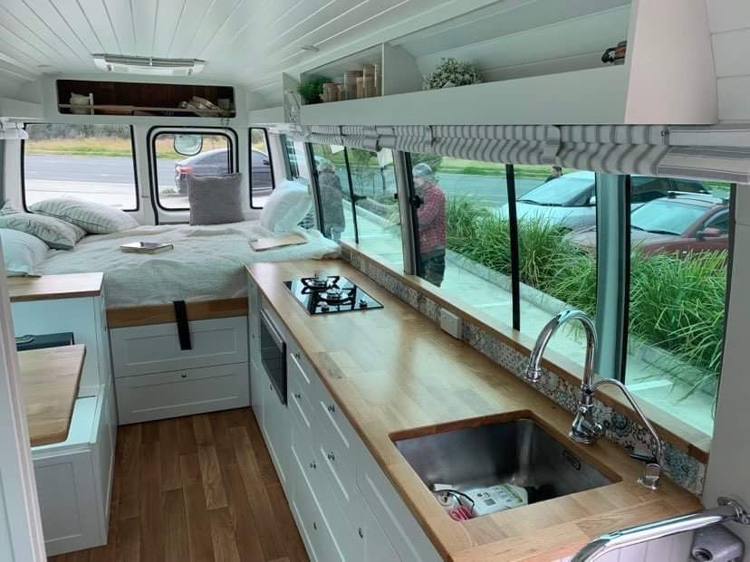 A Kitchen With A Stainless Steel Sink And A Faucet — Live Unbound Campers In Upper Coomera, QLD