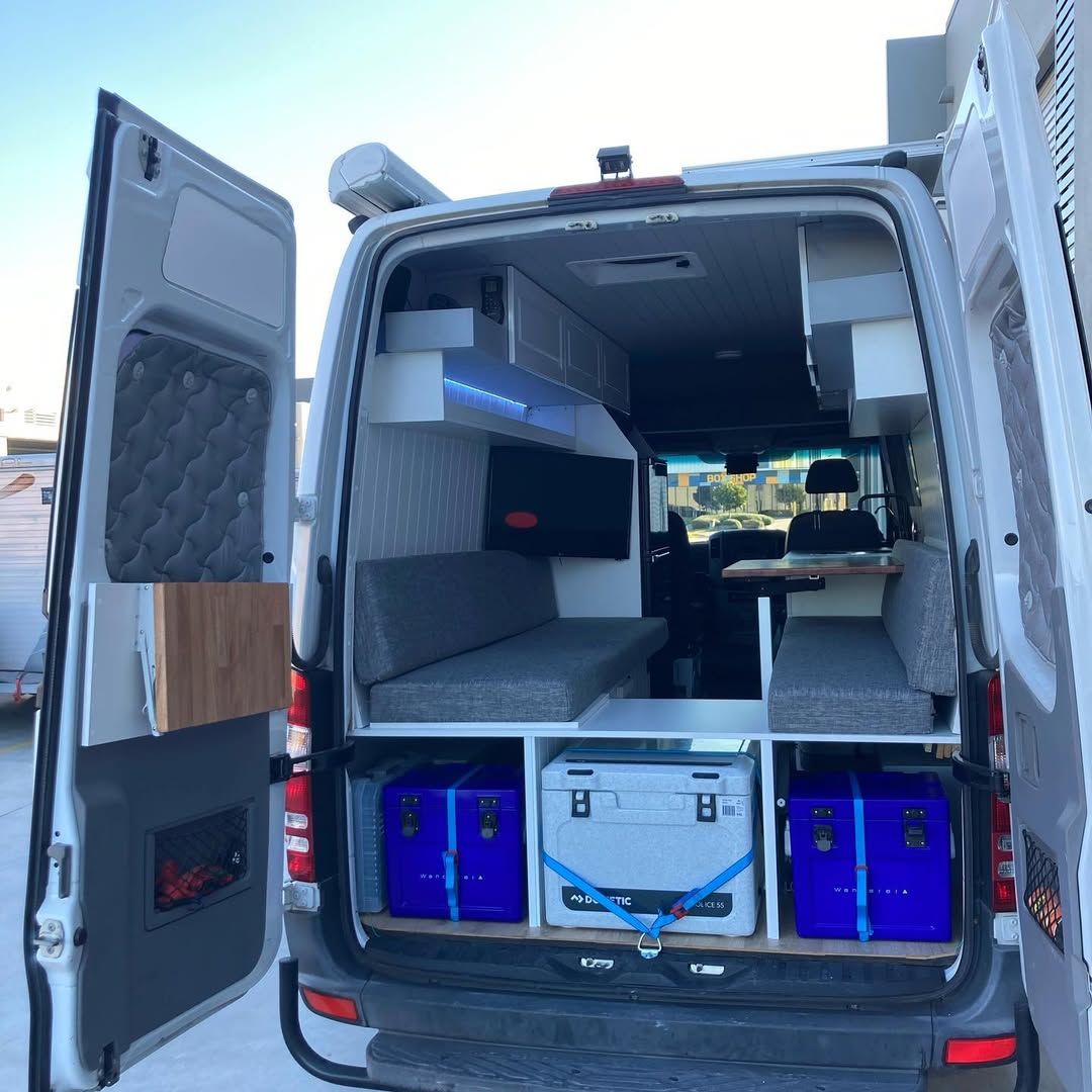 The Back Of A Van With The Door Open — Live Unbound Campers In Upper Coomera, QLD