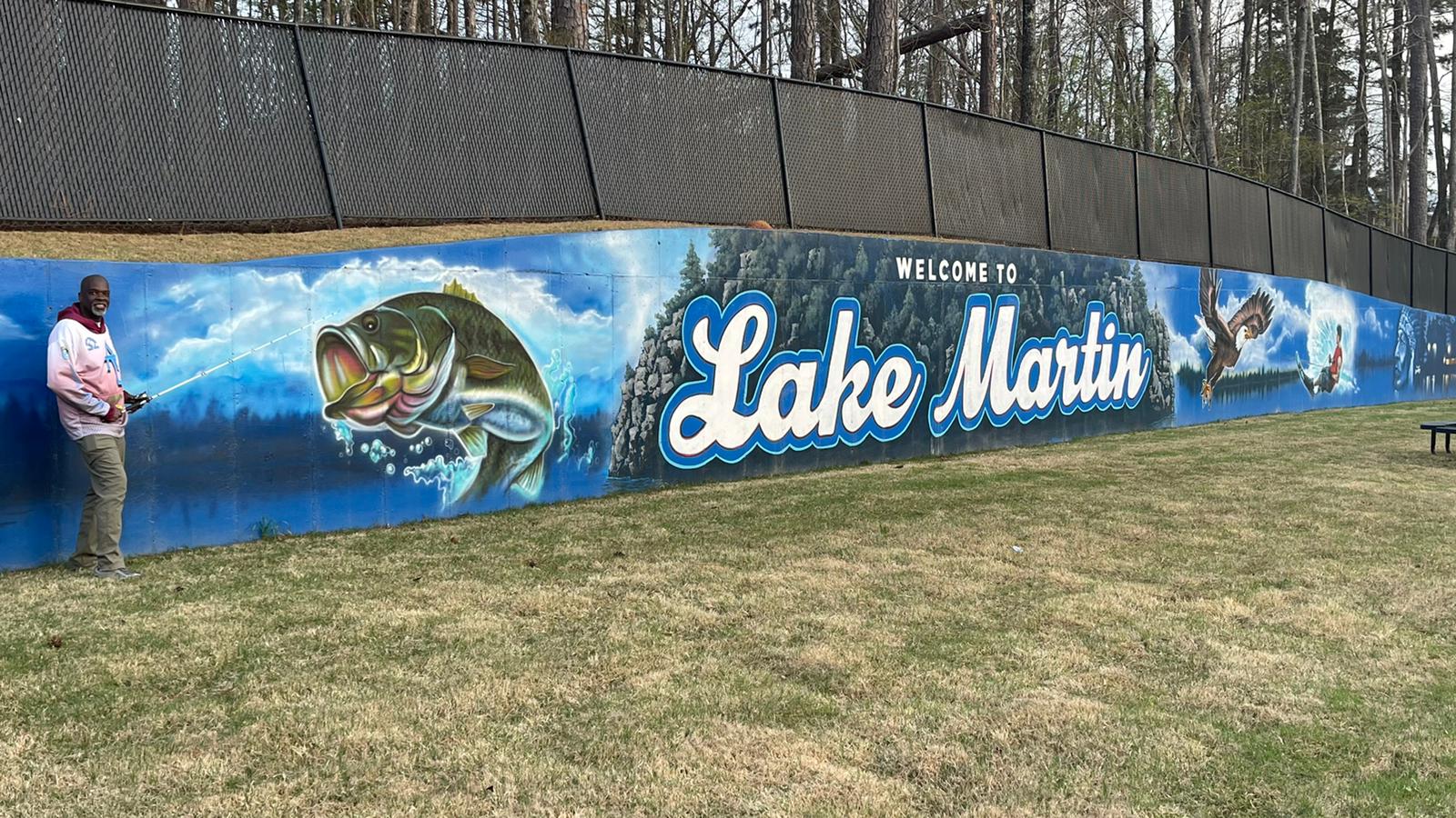 Mural of Lake Martin with a large mouth bass, an eagle, and the words