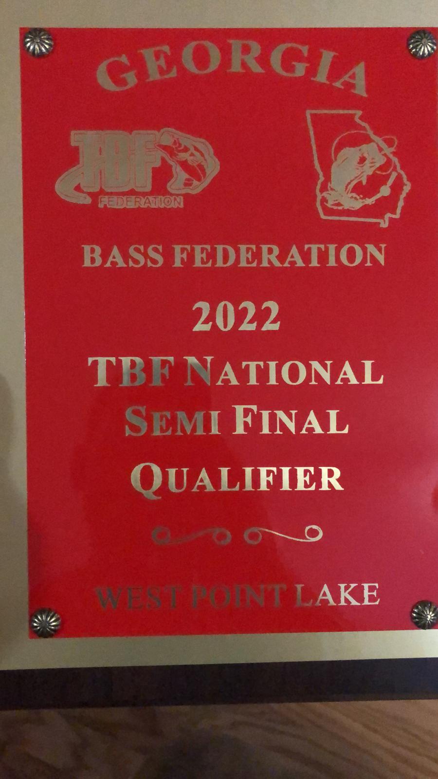 Red plaque with gold text,