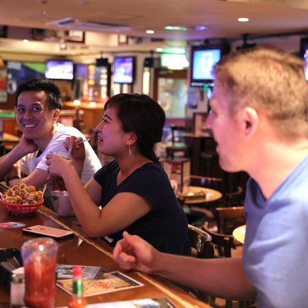 English students enjoying a meal