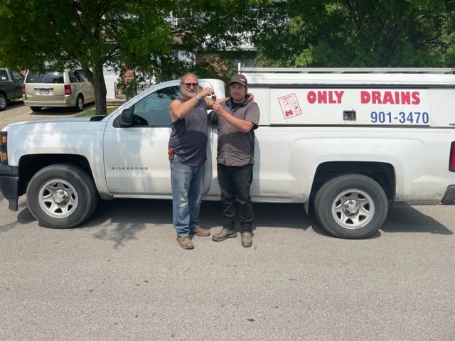 Man Fixing a Clogged Sink — Columbus, OH — Only Drains