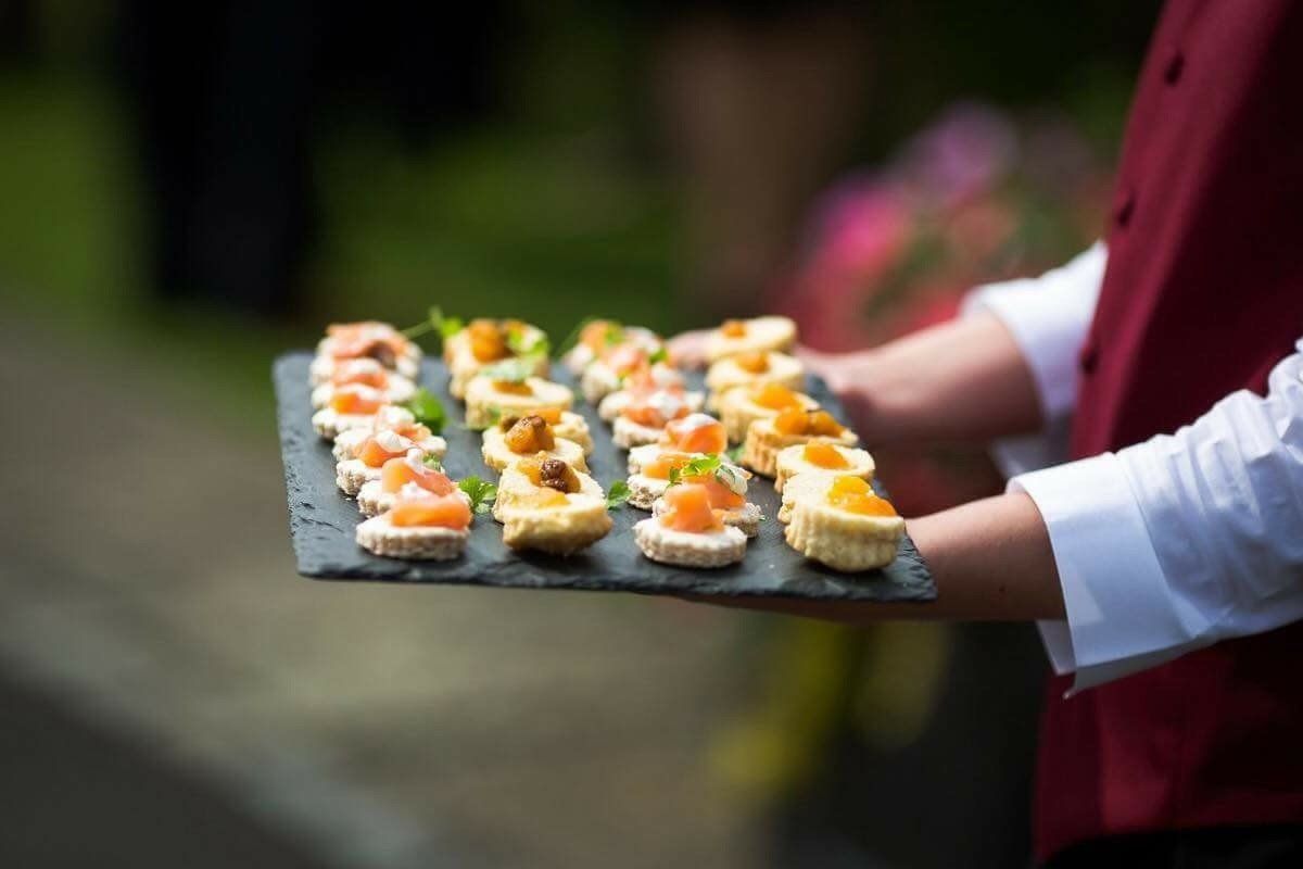 Waitress Serving Canapes
