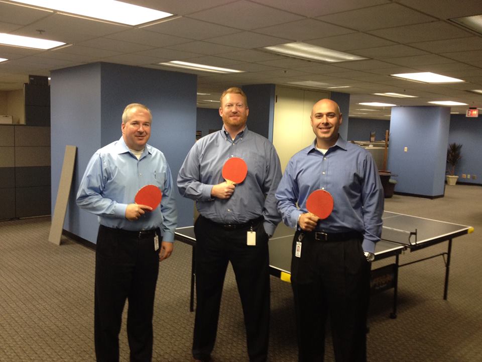 Internet Marketing Company Staff with Pin Pong Paddles