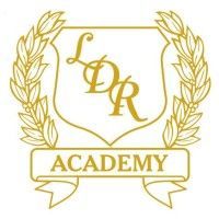 The logo for ldr academy is a shield with a laurel wreath around it.