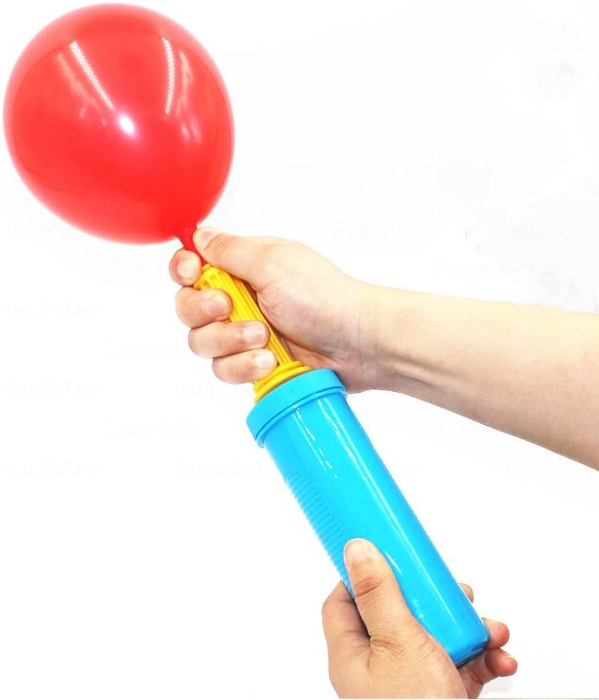 A person is pumping a red balloon with a blue pump
