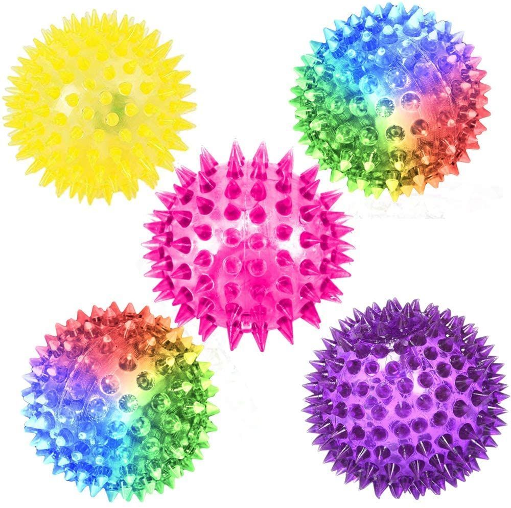 A group of colorful spiky balls on a white background.