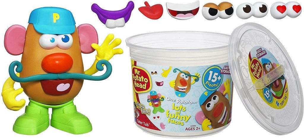 A mr. potato head toy next to a tub of play dough