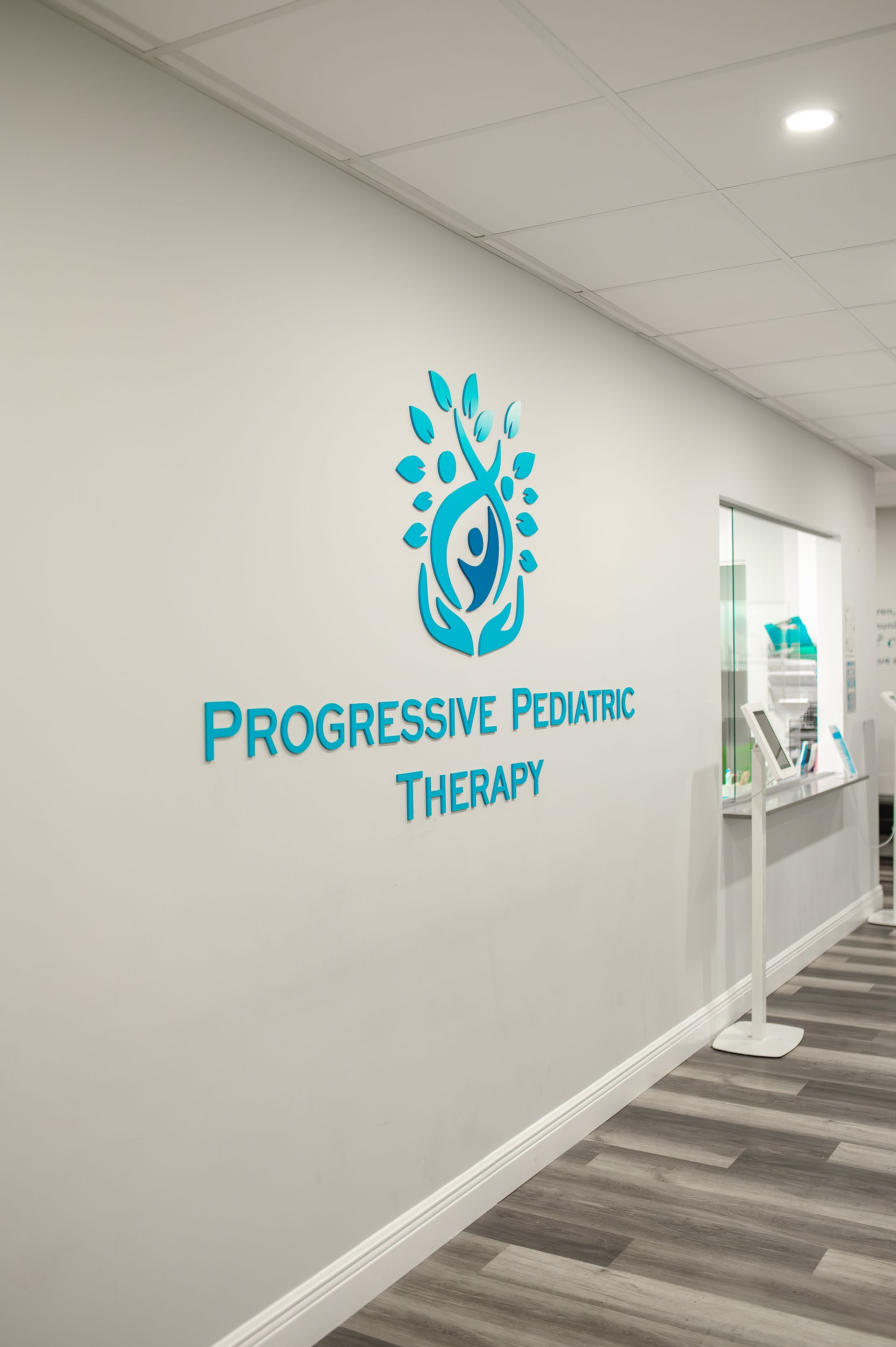 Logo on a wall reading 