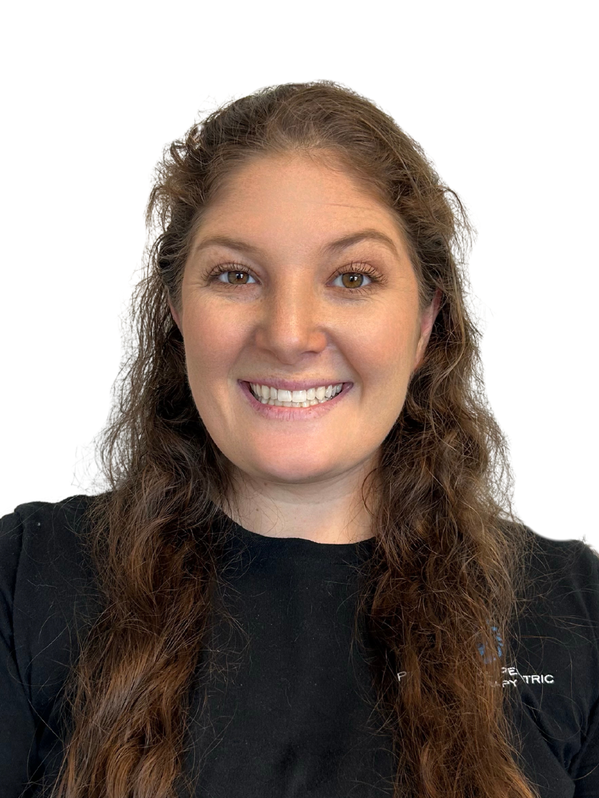 A woman with long hair is smiling and wearing a black shirt.