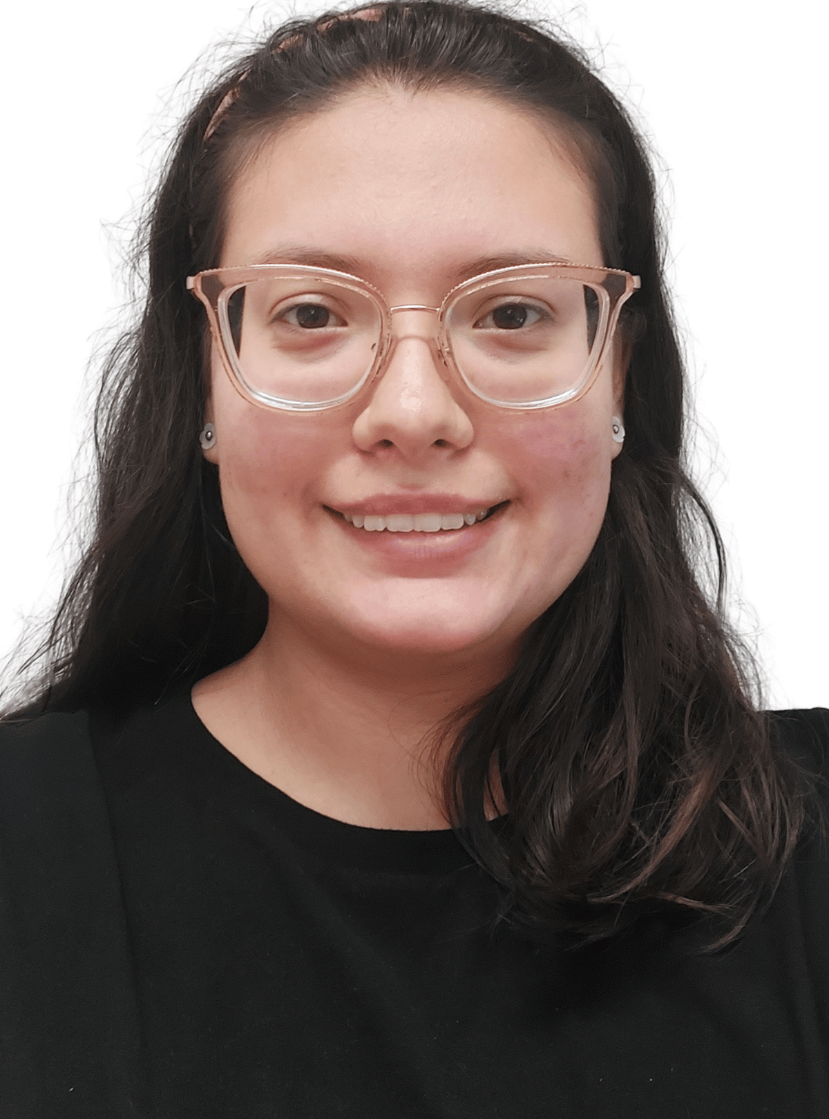 A woman wearing glasses and a black shirt is smiling for the camera.