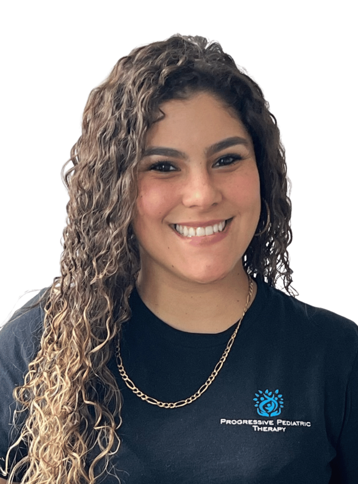 A woman with curly hair is wearing a black shirt and smiling.