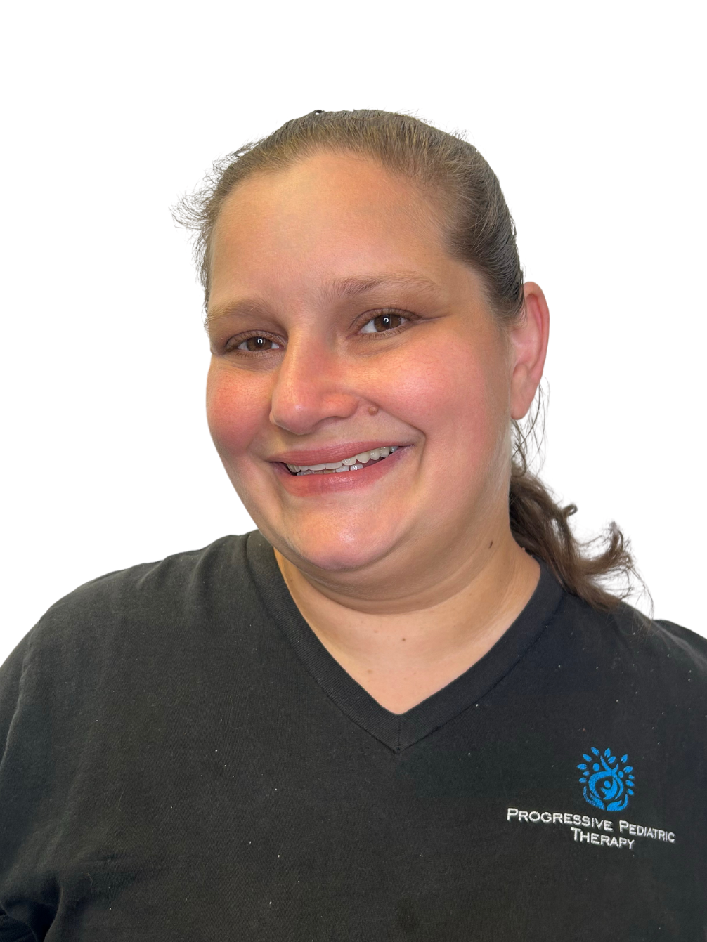 A woman wearing a black shirt with the word therapy on it