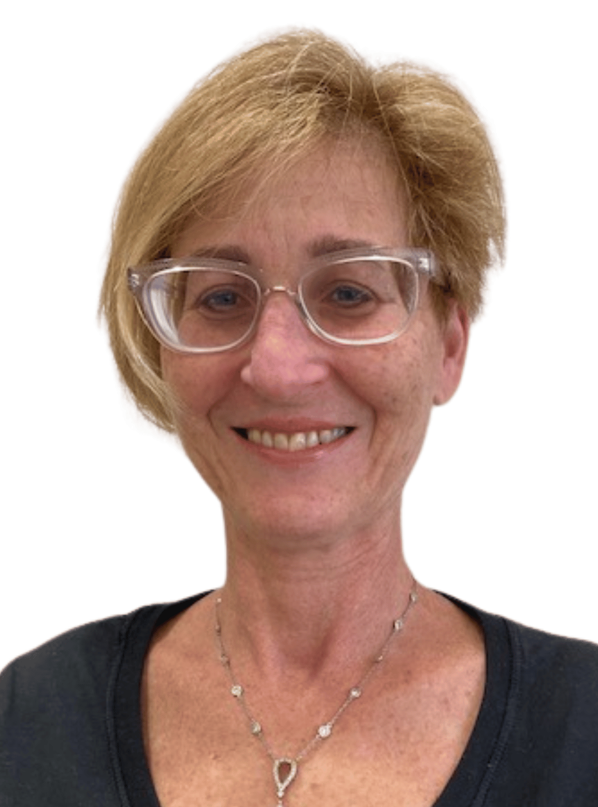 A woman wearing glasses and a necklace smiles for the camera