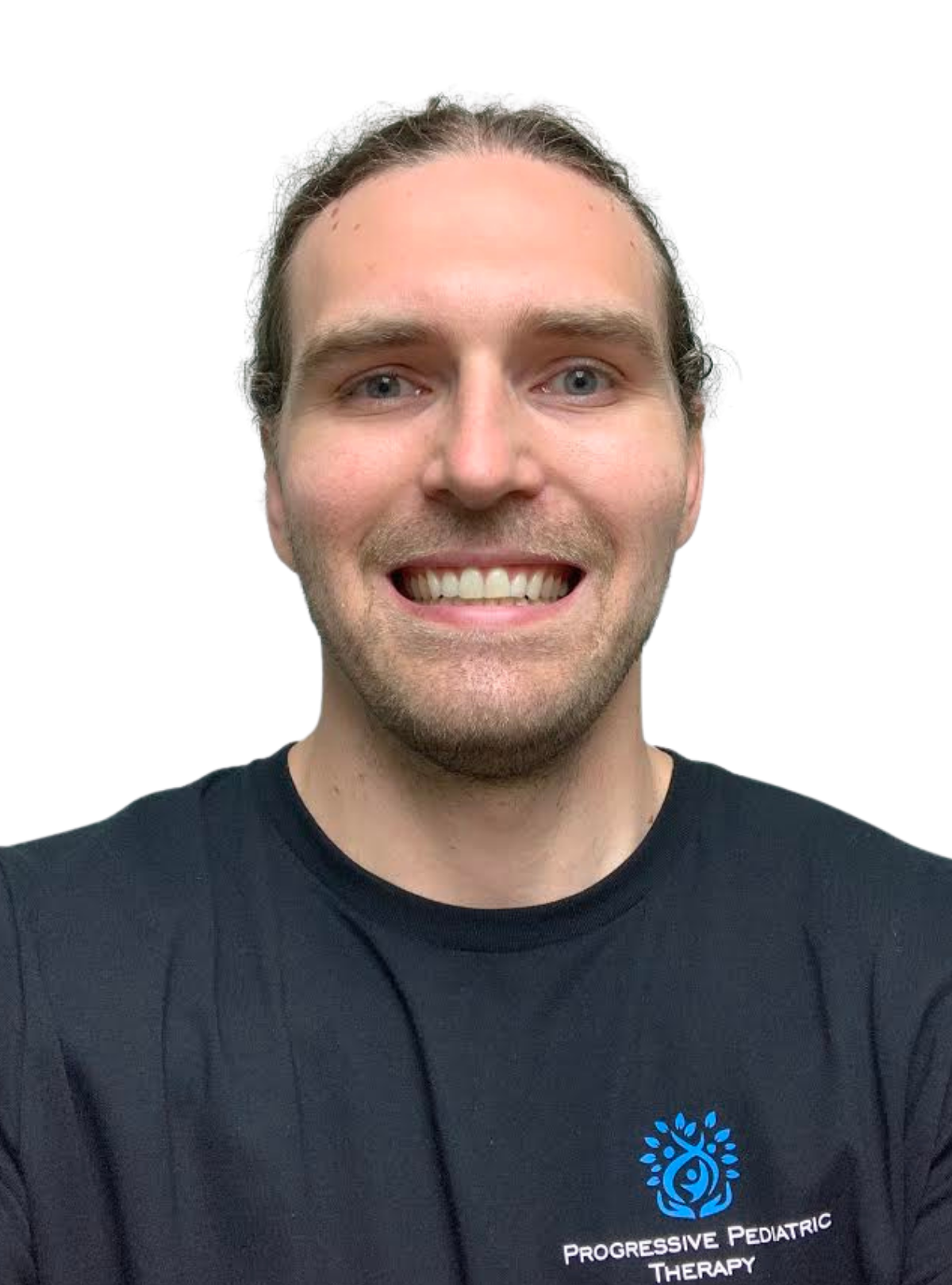 A man with a beard is wearing a black shirt and smiling.