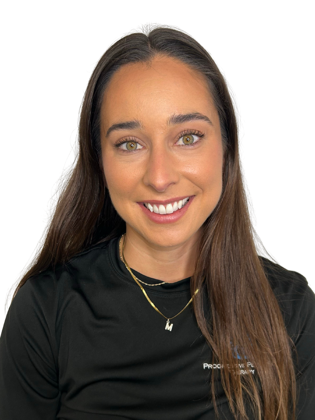 A woman wearing a black shirt and a gold necklace is smiling for the camera.