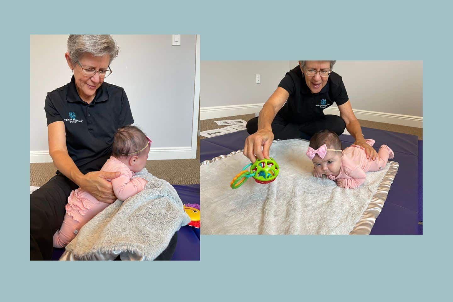 A woman is holding a baby and playing with a toy.