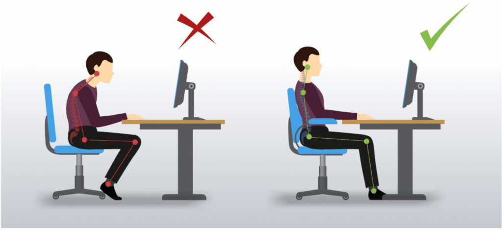 A man is sitting at a desk with a computer.