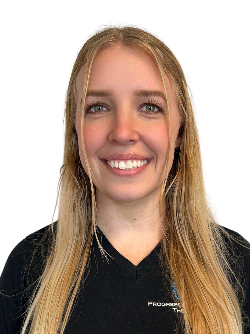 A woman with long blonde hair is wearing a black shirt and smiling.