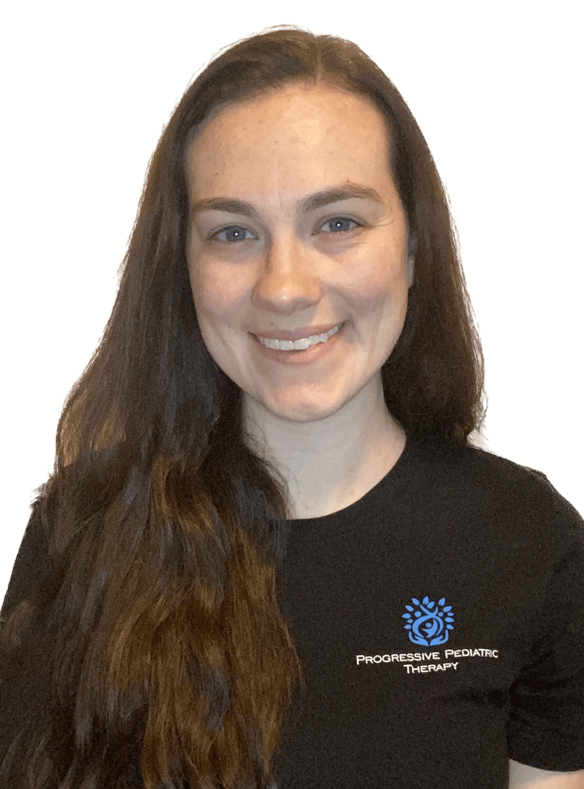 A woman with long hair is wearing a black shirt and smiling.