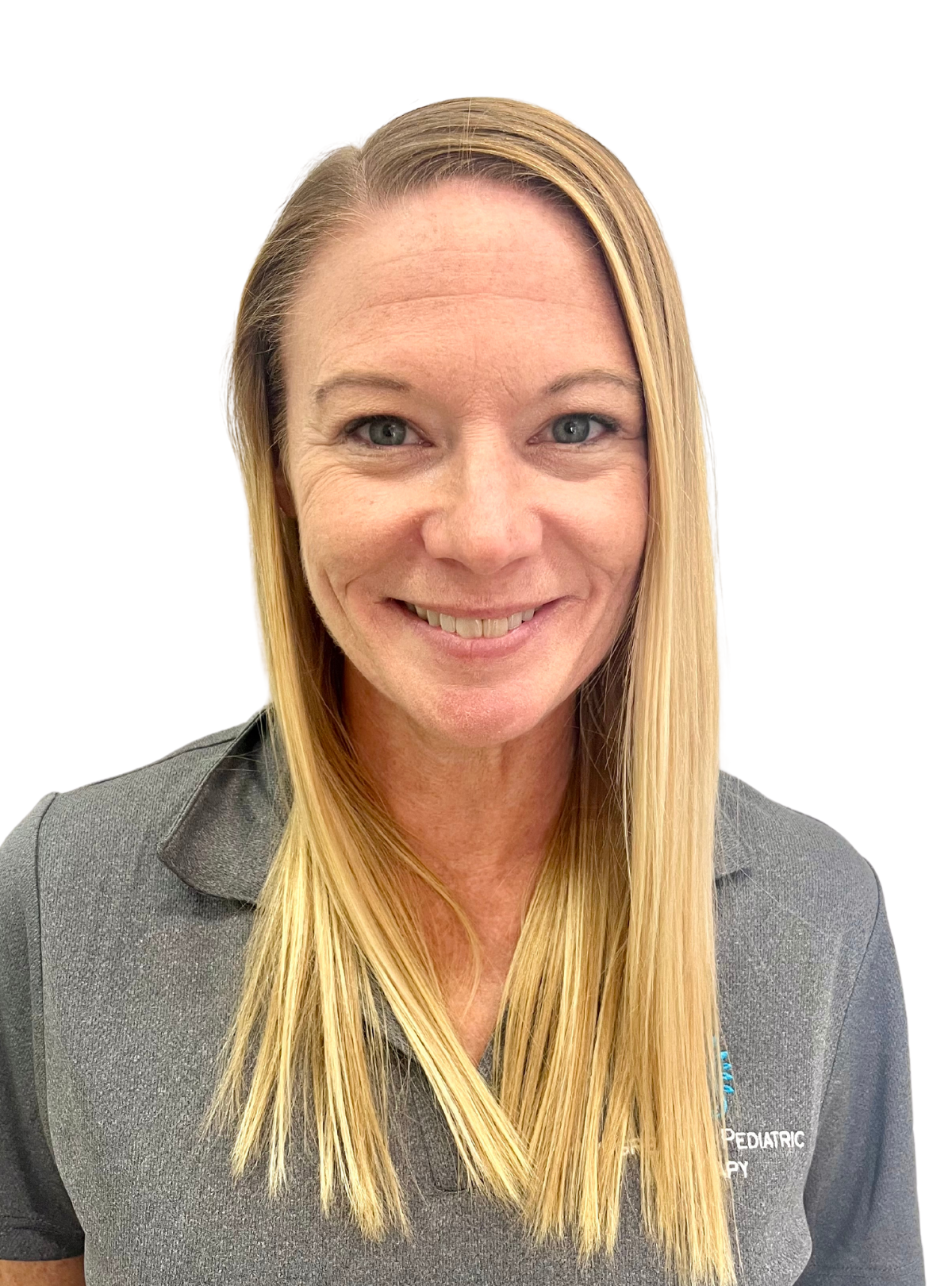 A woman with long blonde hair is wearing a gray shirt and smiling.