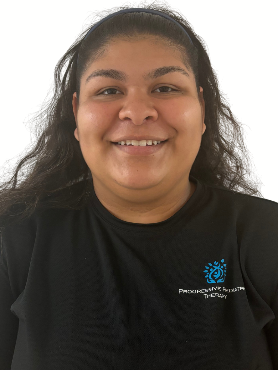 A woman in a black shirt is smiling for the camera