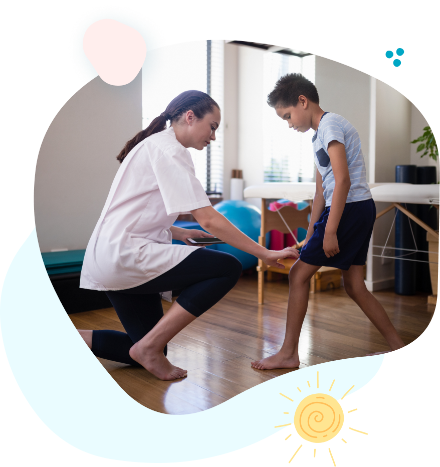 a therapist helping a child with walking