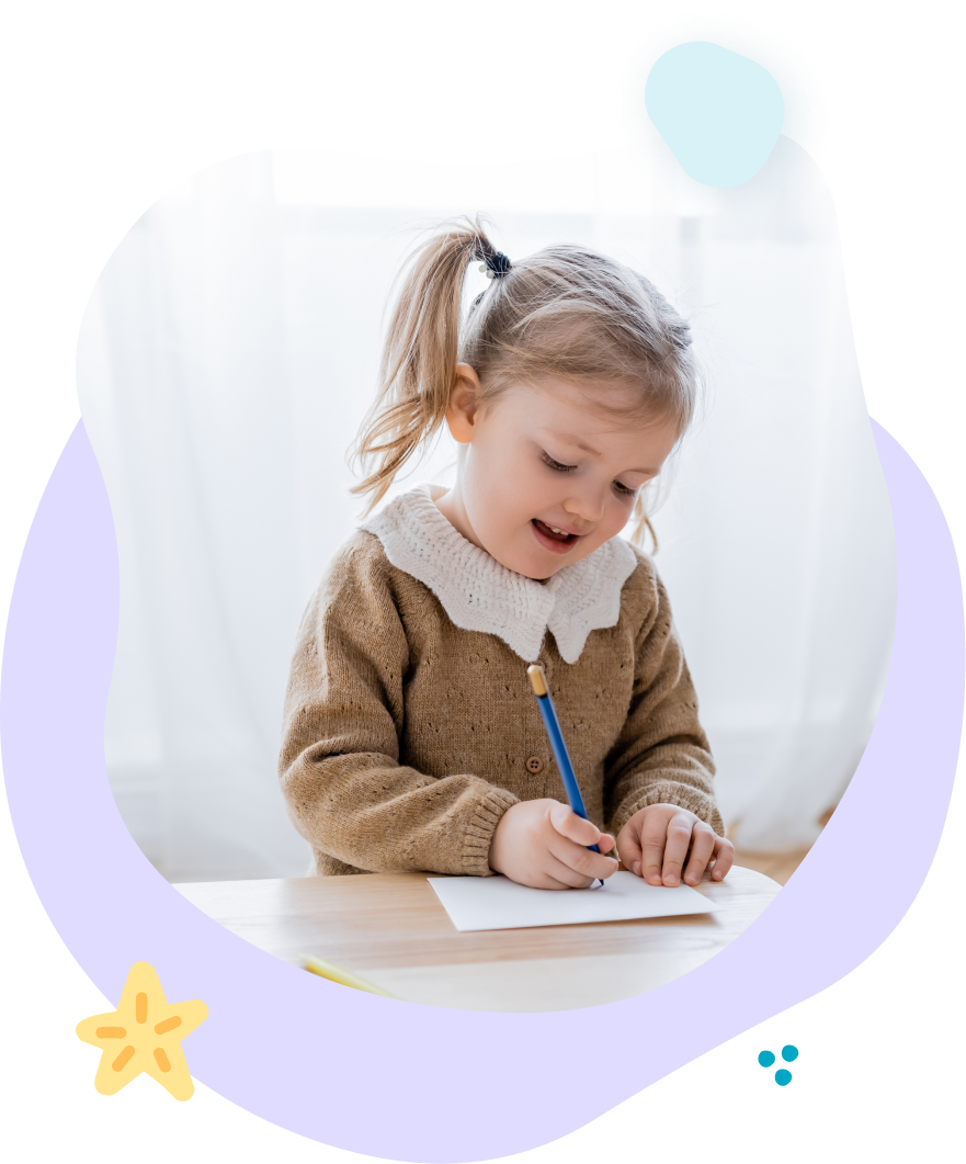 A little girl is sitting at a table writing on a piece of paper with a pencil.