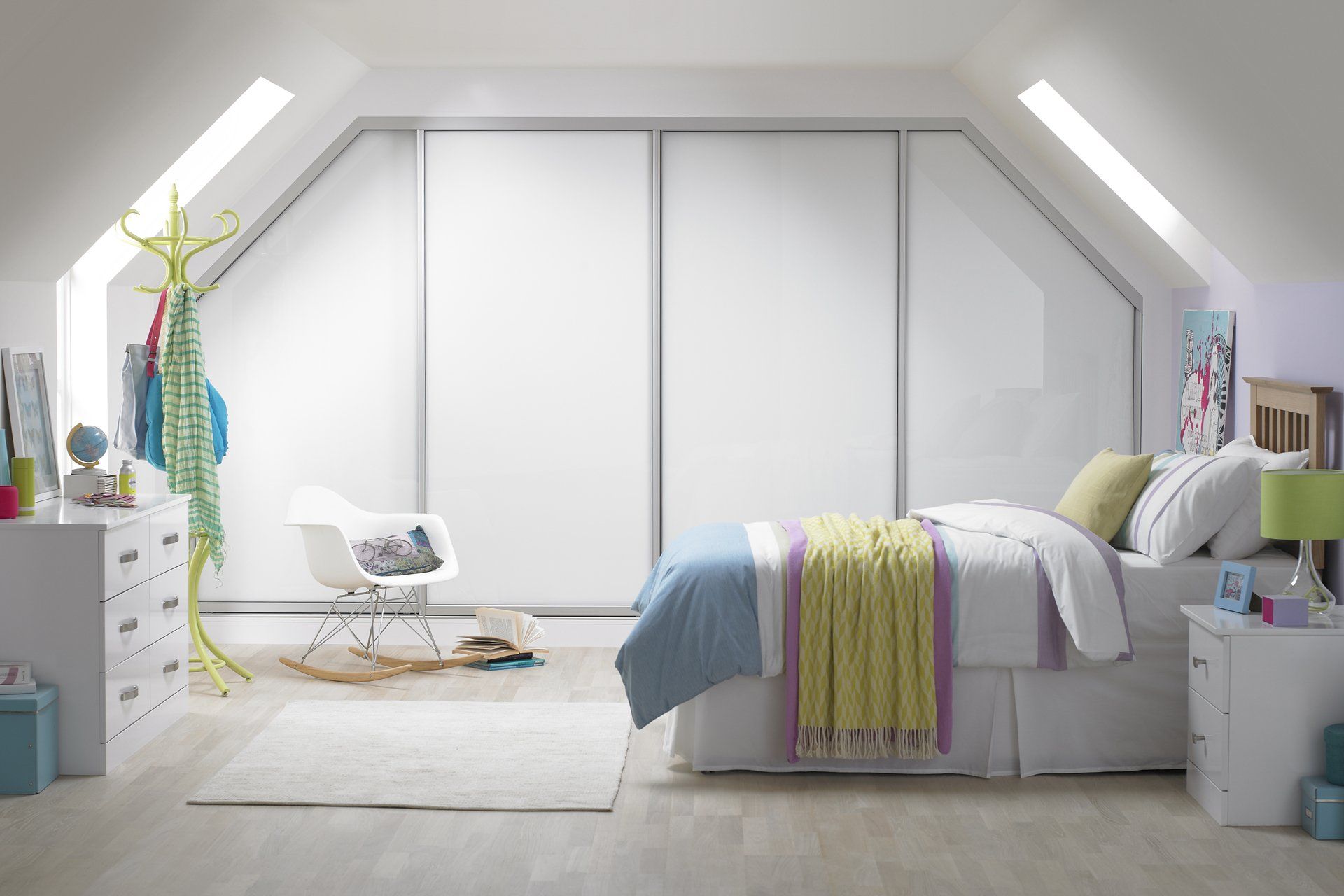 White glass sliding wardrobes in Loft Room