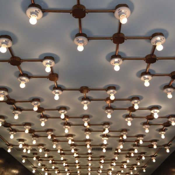 A ceiling with a lot of lights on it