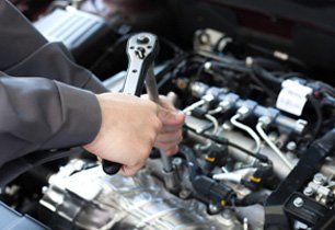 mechanic offering car engine repairs
