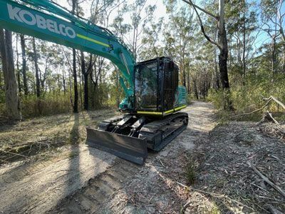 Excavator Working on a Construction Site — Verification of Competency Tamworth
