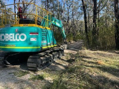 Rear View of Excavator — Verification of Competency Tamworth